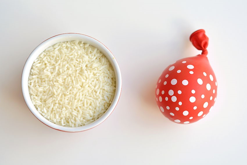 bowl of rice and balloon stress ball