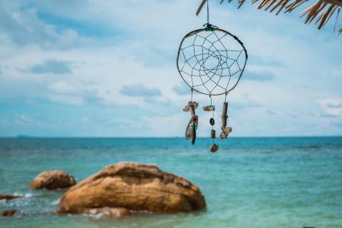 dream catcher with ocean in background