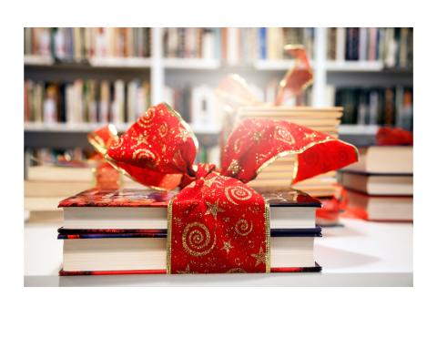 books tied with a fancy red bow