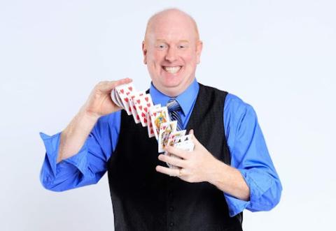 magician doing card trick