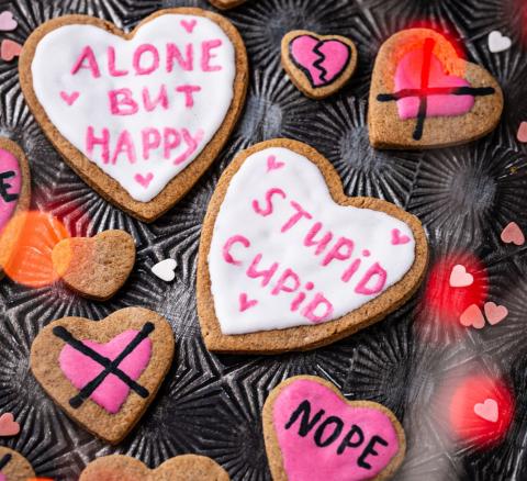 heart-shaped cookies with anti-valentine messages