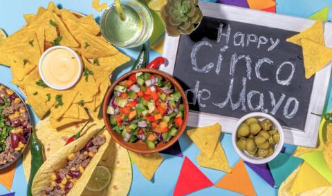 Mexican food with Cinco de Mayo sign