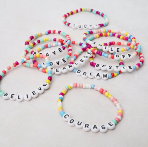 friendship bracelets with various words like 'brave' and 'bff'