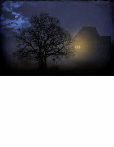 haunting picture of a spooky house at night