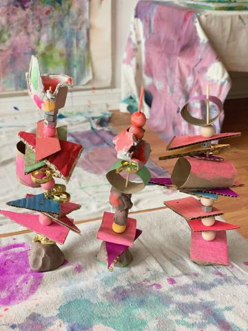 sculptures made from skewers and random art supplies