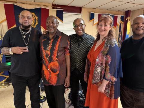 photo of four Penny Black band members