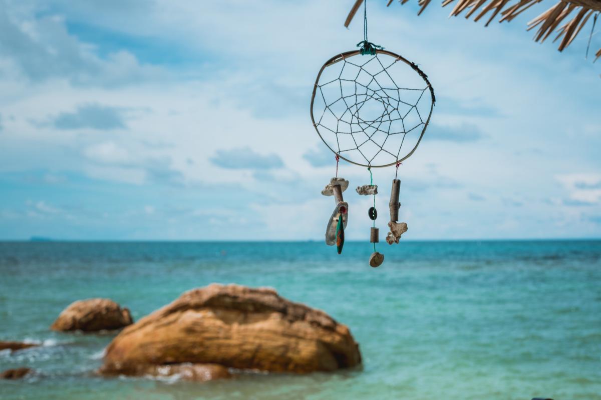 dream catcher with ocean in background