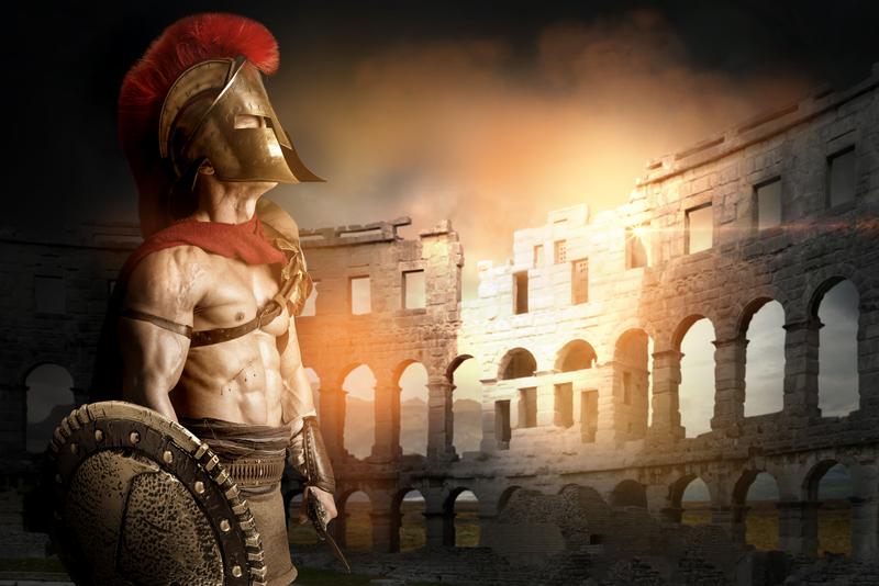 gladiator against backdrop of the Coliseum