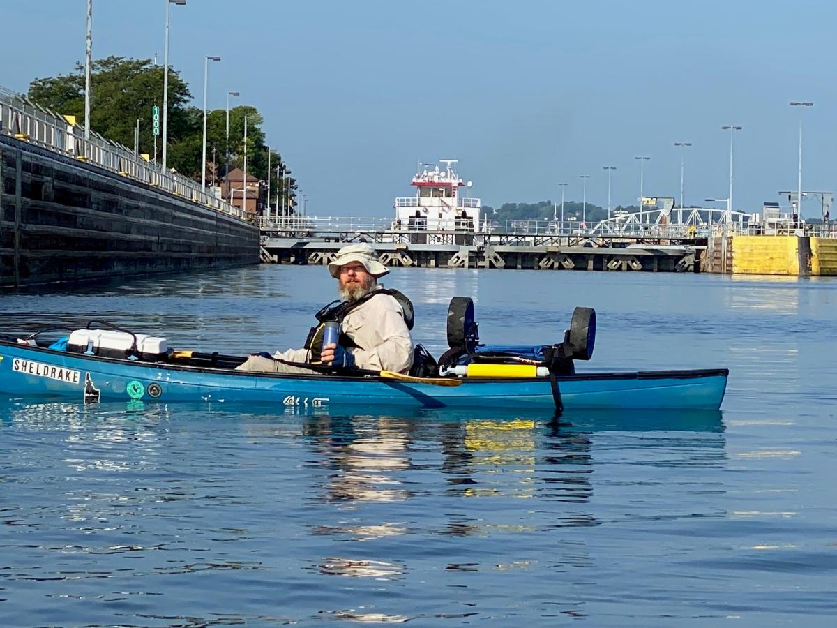 man in canoe on Mississippi River