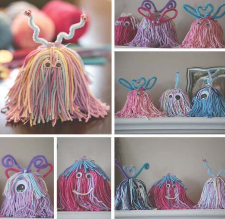 little monsters made from yarn and pipe cleaners